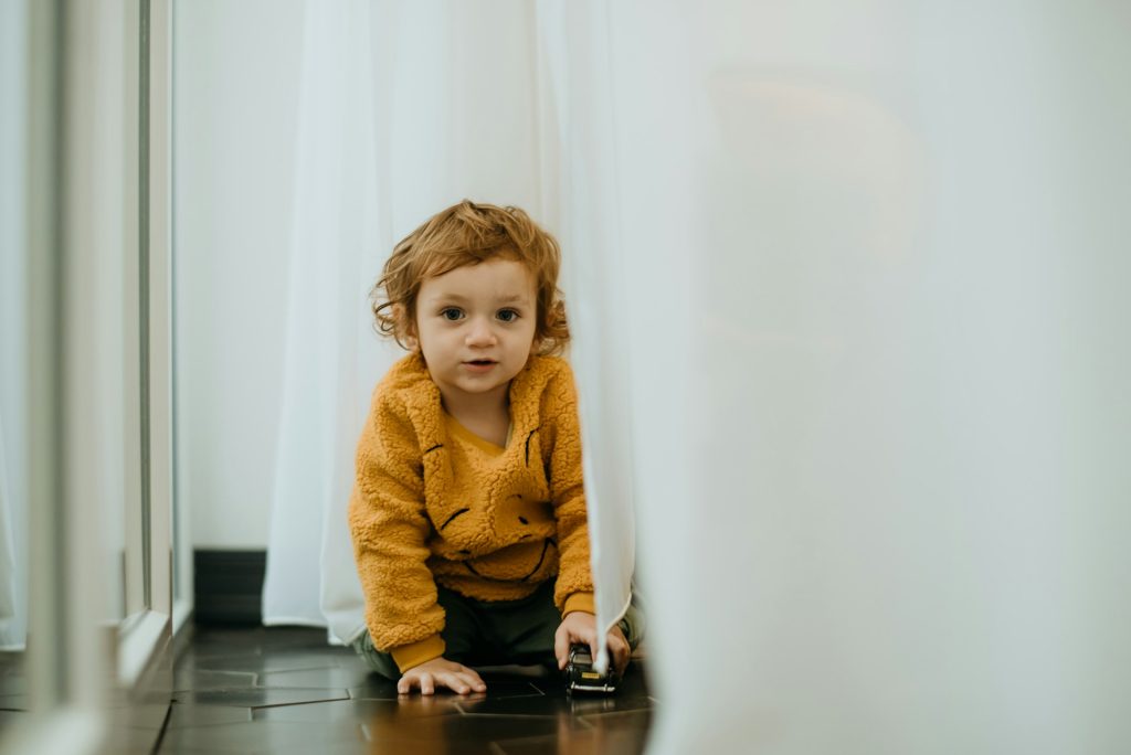 A joyful family portrait capturing an adorable little girl.